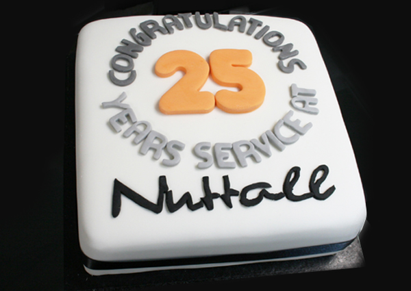 Cake presented to Jamie Joyce, Flexeserve CEO, celebrating 25 years of service