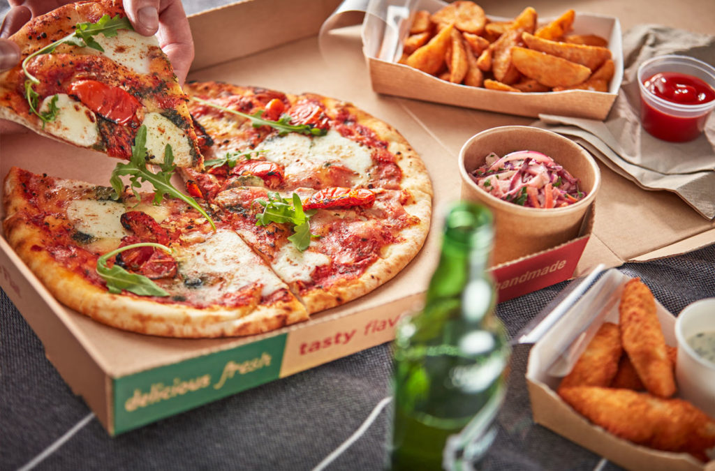 Pizza and potato wedges that have been kept warm with Flexeserve's true hot-holding