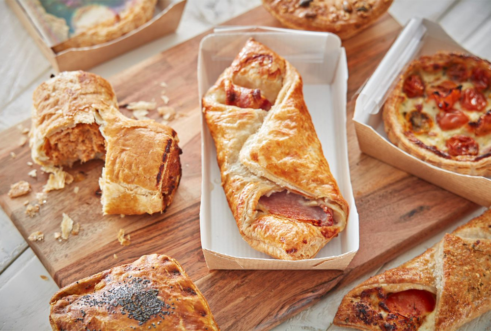 A range of hot pastries including a sausage roll and a bacon and cheese wrap all suitable for Flexeserve's hot-holding solution