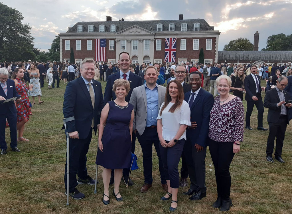 Flexeserve CEO, Jamie Joyce with members of the U.S. Embassy