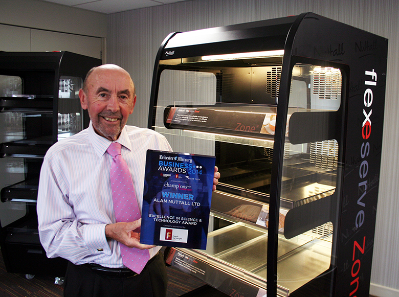 Alan Nuttall accepting an award for the revolutionary Flexeserve Zone heated display for hot food-to-go