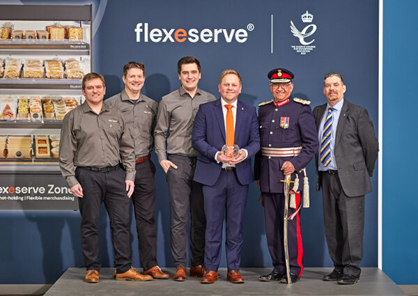 Jamie Joyce holding the Queens Award for Enterprise: Innovation 2022 with members of the Flexeserve team along with Michael Kapur Esq OBE, His Majesty’s Lord-Lieutenant of Leicestershire