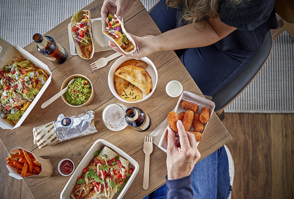 Table spread showing the variety of food that Flexeserve's industry-leading equipment is capable of hot-holding