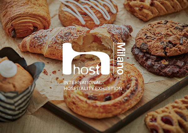 HostMilano 2025 logo with spread of warm bakery items, hot-held only with Flexeserve