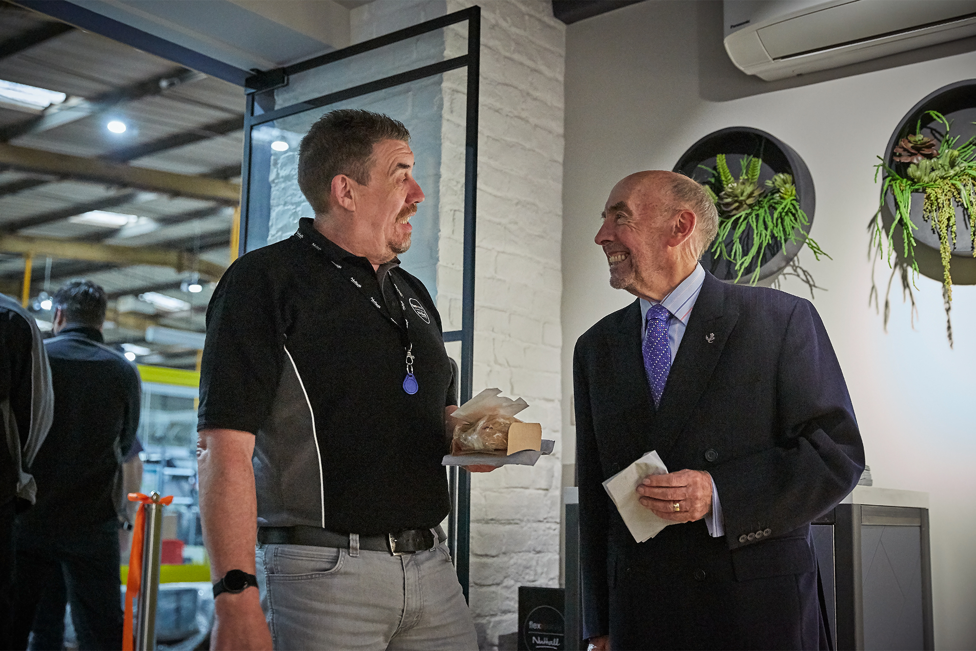Mick with Alan Nuttall, former Founder of The Alan Nuttall Partnership, celebrating the opening of The Hive, Flexeserve's new collaboration area for Partners to meet, eat and innovate together