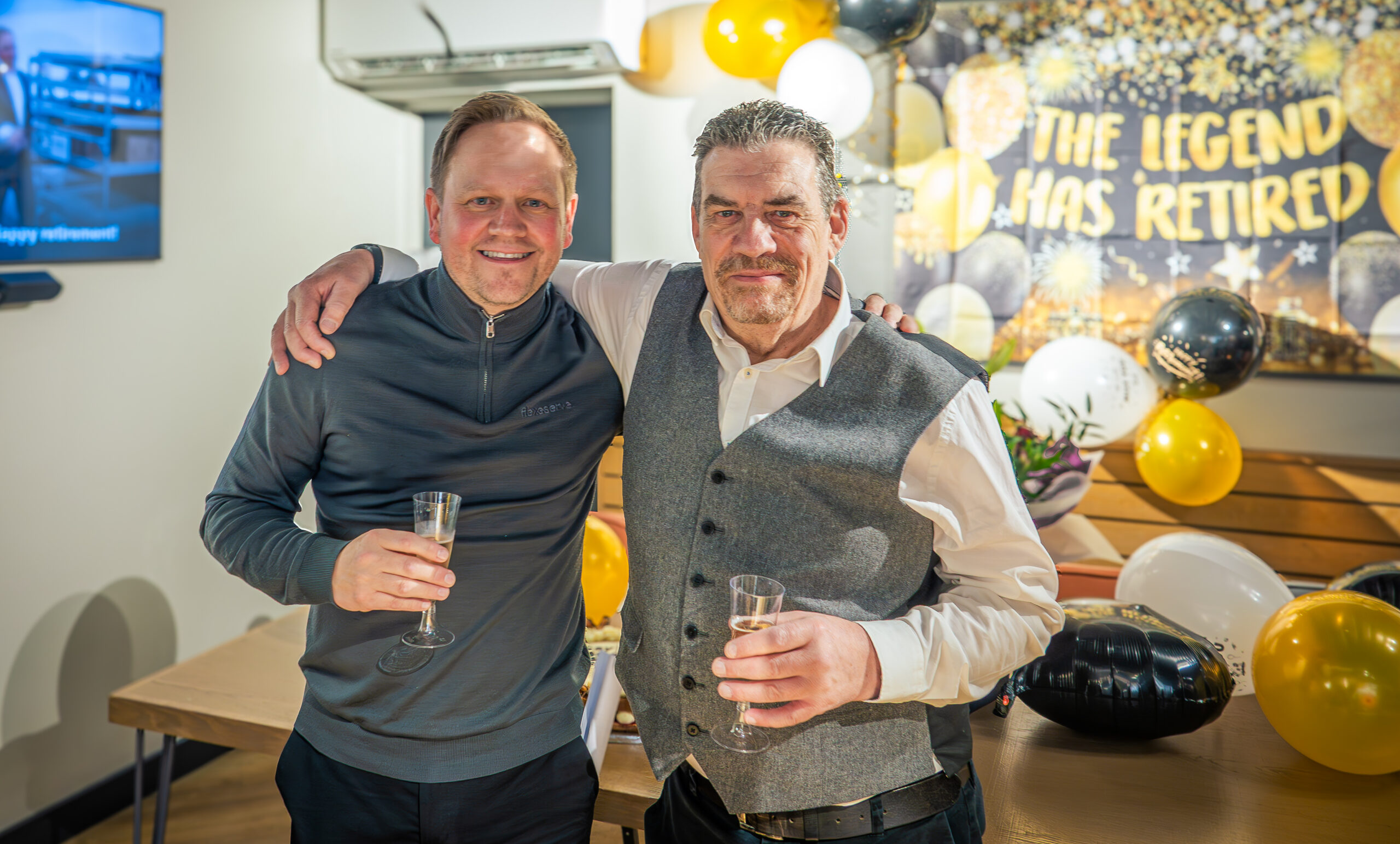 Flexeserve Global CEO, Jamie Joyce and Mick Steele celebrate the Technical Director's retirement